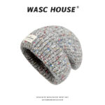custom multi color fleck tweed knitted skull cap, thick vertical cable texture, fold cuff slouchy fit, private brand sewed white fabric tag winter beanie