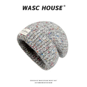 custom multi color fleck tweed knitted skull cap, thick vertical cable texture, fold cuff slouchy fit, private brand sewed white fabric tag winter beanie