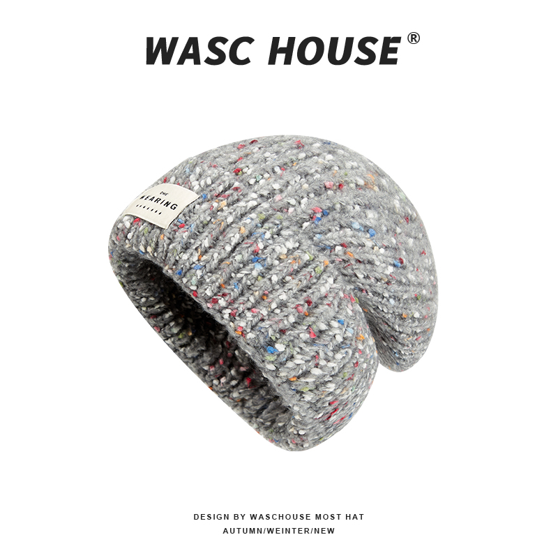 custom multi color fleck tweed knitted skull cap, thick vertical cable texture, fold cuff slouchy fit, private brand sewed white fabric tag winter beanie