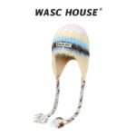 custom gradient striped fuzzy earflap hat with braided tassels & woven label