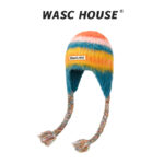custom gradient striped fuzzy earflap hat with braided tassels & woven label