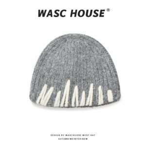 custom marled grey fuzzy wool blend vertical rib skull cap, hand sewn raised off white abstract irregular strip embroidery, no cuff slim fit minimal art winter hat