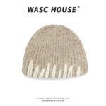 custom marled grey fuzzy wool blend vertical rib skull cap, hand sewn raised off white abstract irregular strip embroidery, no cuff slim fit minimal art winter hat