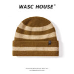 custom off white base thick black horizontal stripe super soft fuzzy wool mix skull cap, full matching stripe wide fold cuff, tiny side sew on black brand tag minimal french daily winter hat